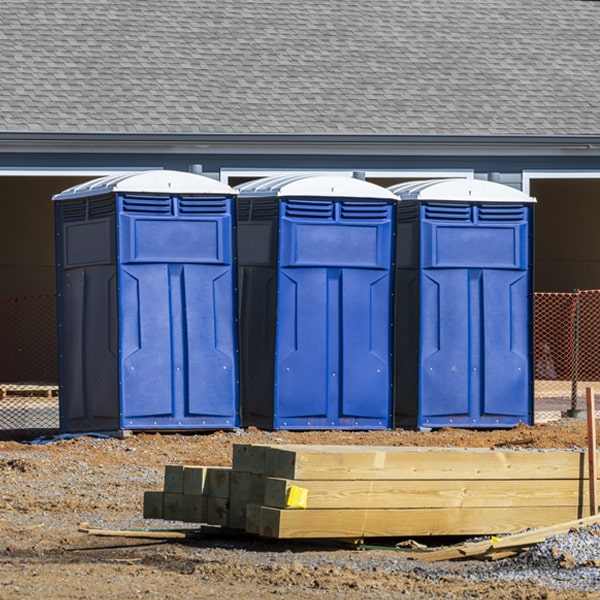 what is the cost difference between standard and deluxe portable toilet rentals in Mono City California